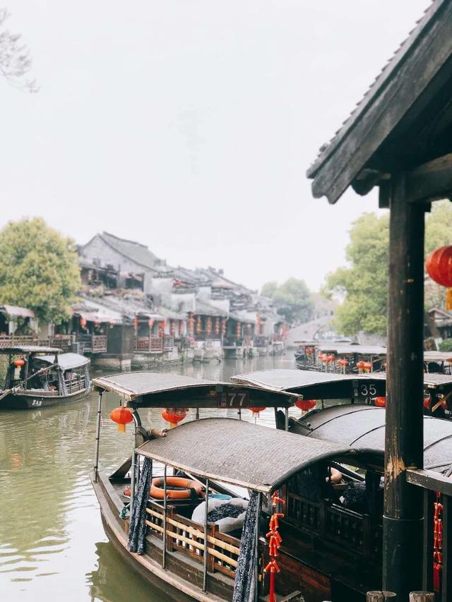 烟花三月下江南,去一座从唐代游到清代的古镇,就藏在西湖边上!