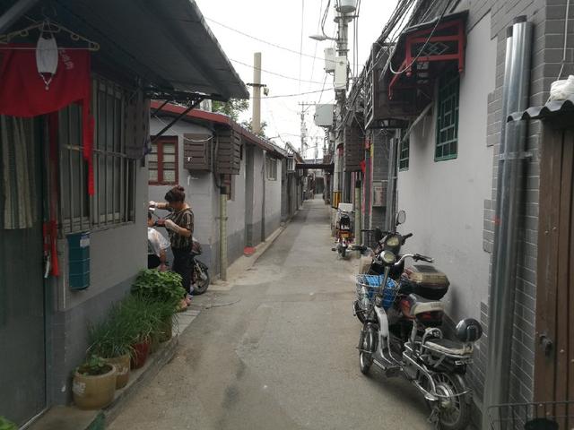 北京老胡同保护的两难:胡同是给人观赏的,还是给居民居住的?