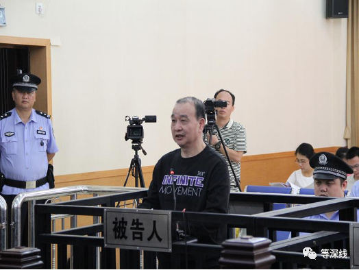 赖月亮受审。  桂林市临桂区法院供图