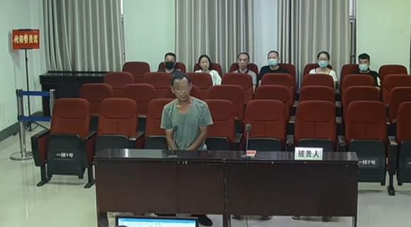 2020年8月19日,刘广聚在一审法庭上。图片来源:中国庭审公开网庭审录像截图。