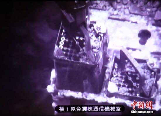 资料图:2019年,日本东京电力公司启动了从福岛第一核电站3号机组反应堆旁的乏燃料池搬出燃料的作业。