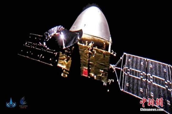  资料图：中国国家航天局发布的中国首次火星探测任务天问一号探测器飞行图像。 中新社发 中国国家航天局 供图