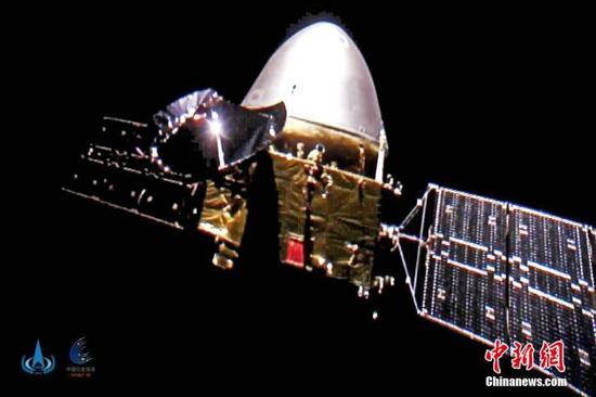 资料图:中国国家航天局发布的中国首次火星探测任务天问一号探测器飞行图像。 中新社发 中国国家航天局 供图